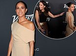 Awkward moment Meghan Markle is interrupted by aide while being photographed at glitzy Variety gala - before the Duchess squeezes her hand and continues to beam for the cameras