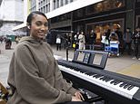 How many police officers DOES it take to shut down a gospel singer? New video shows FIVE of Met's finest jobsworths threatening to arrest Christian singer on Oxford Street as onlookers say 'shouldn't you be trying to catch rapists and murderers?'
