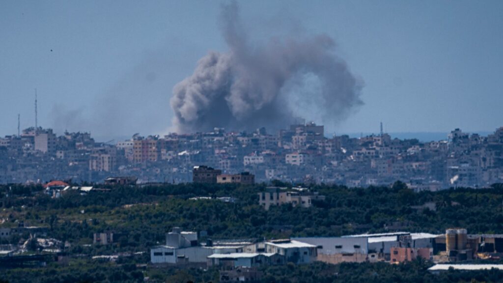 An explosion rises in the northern Gaza Strip, as seen from southern Israel. Pic: AP