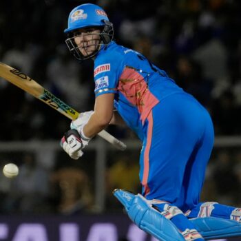 Mumbai Indians Nat Sciver-Brunt plays a shot during during the Women's Premier League Twenty20 cricket final match between Delhi Captials and Mumbai Indians in Mumbai, India, Sunday, March 26, 2023. (AP Photo/Rajanish Kakade)