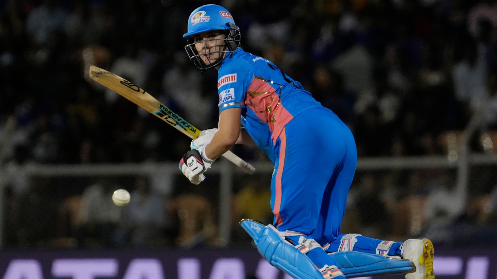 Mumbai Indians Nat Sciver-Brunt plays a shot during during the Women's Premier League Twenty20 cricket final match between Delhi Captials and Mumbai Indians in Mumbai, India, Sunday, March 26, 2023. (AP Photo/Rajanish Kakade)