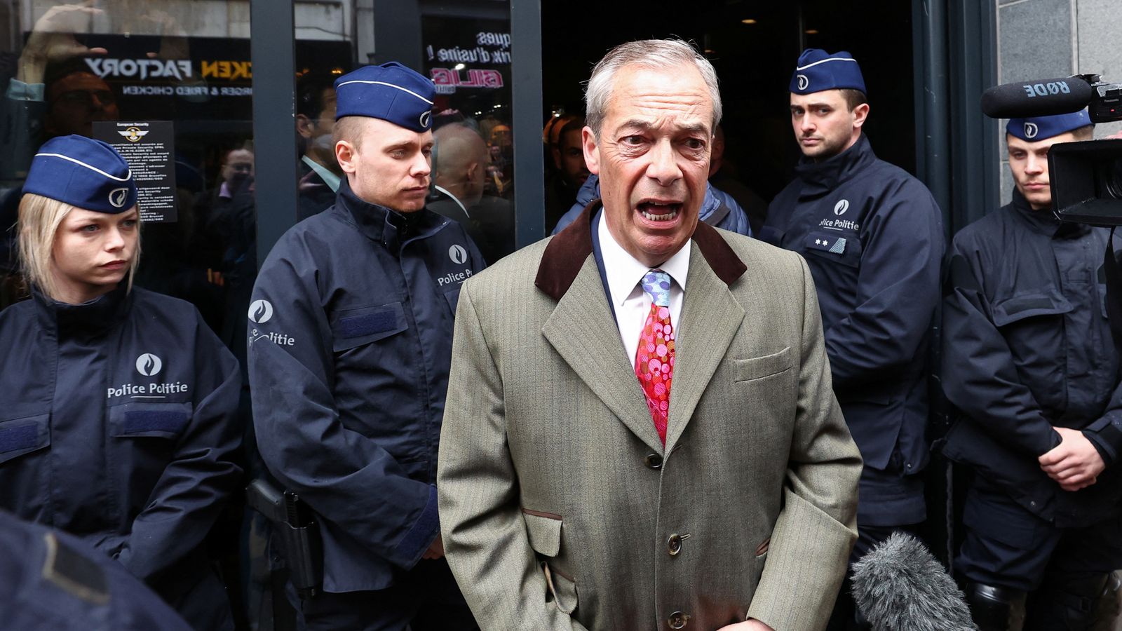 Farage says police would have to 'drag him off stage' after attempt to shut down conference