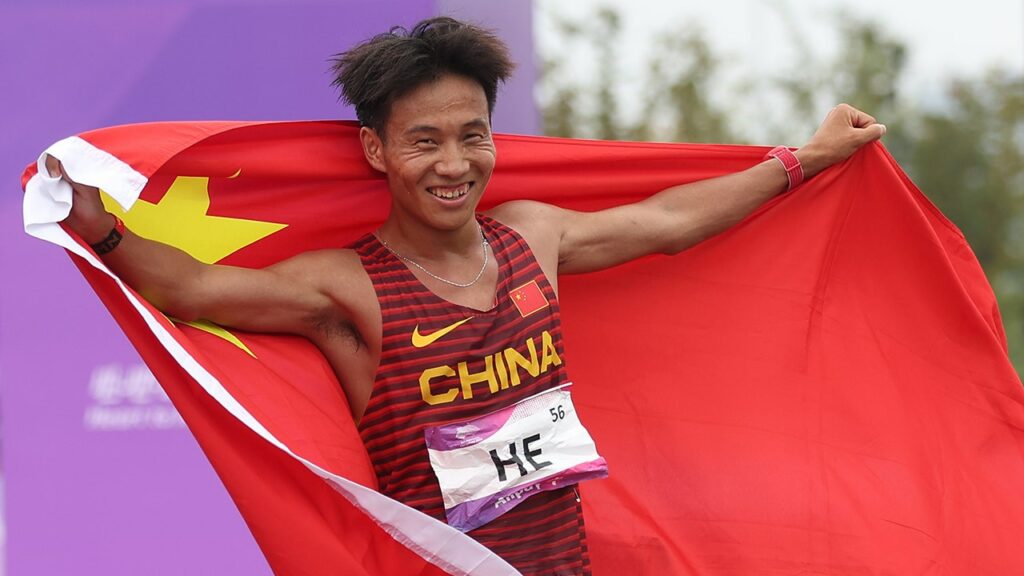 Beijing half marathon winner stripped of medal after video shows competitors allowing Chinese runner to win