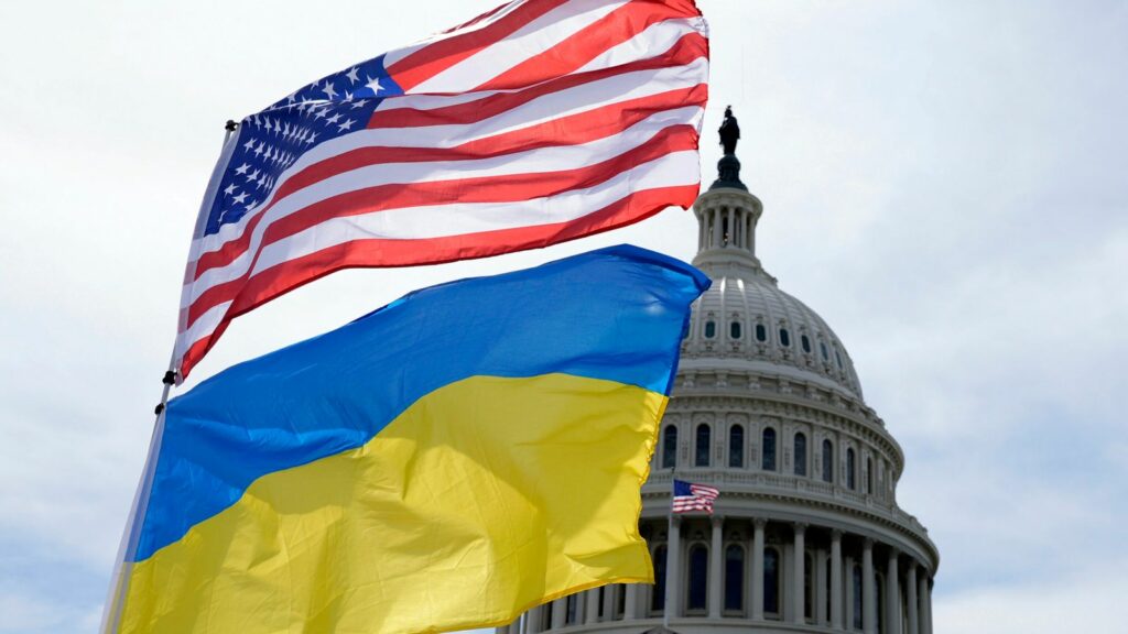 The American and Ukrainian flags wave in the wind outside of the Capitol on 23 April. Pic: AP Photo/Mariam Zuhaib