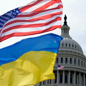 The American and Ukrainian flags wave in the wind outside of the Capitol on 23 April. Pic: AP Photo/Mariam Zuhaib