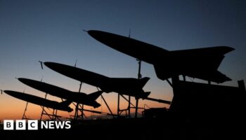 File photo showing Iranian drones during a military exercise in an undisclosed location in Iran (24 August 2022