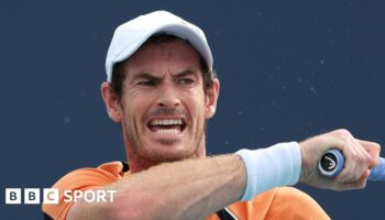 Andy Murray grimaces after injuring his ankle in Miami