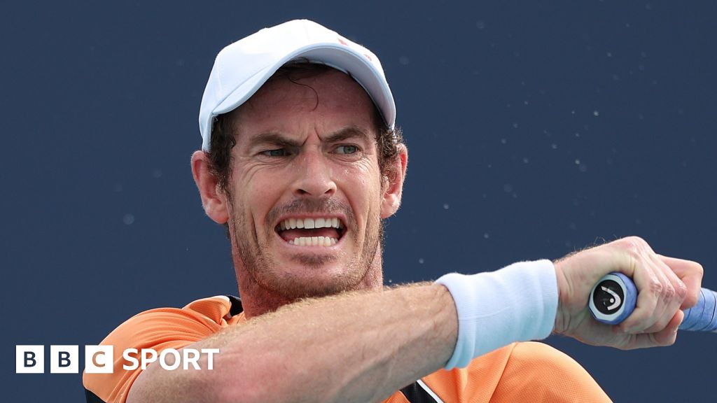 Andy Murray grimaces after injuring his ankle in Miami