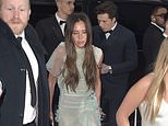 Victoria Beckham arrives at her 50th birthday party at a swanky private members club on crutches - as she's joined by her family, ALL her Spice Girls bandmates and a bevy of A-List stars including Tom Cruise and Eva Longoria