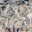 Palestinians look at the destruction after an Israeli airstrike in Rafah, Gaza Strip. Monday, April 29, 2024. (AP Photo/Mohammad Jahjouh)