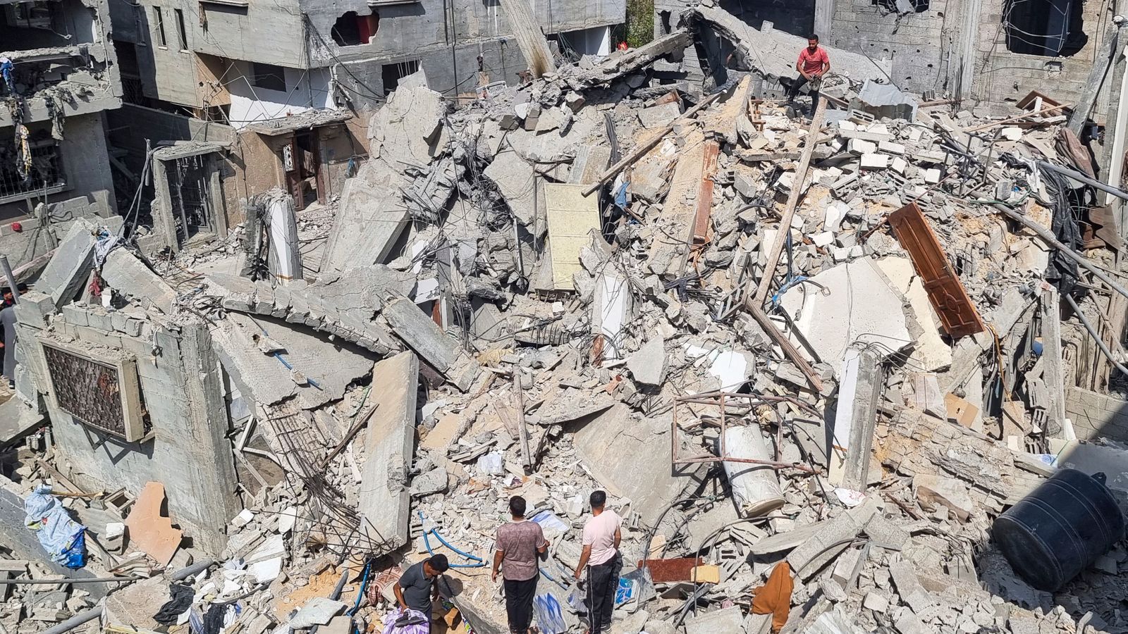 Palestinians look at the destruction after an Israeli airstrike in Rafah, Gaza Strip. Monday, April 29, 2024. (AP Photo/Mohammad Jahjouh)