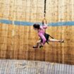 Researchers tied people to bungee cords to simulate the moon's gravity and asked them to run around a rented 'wall of death'. Pic: University of Milan