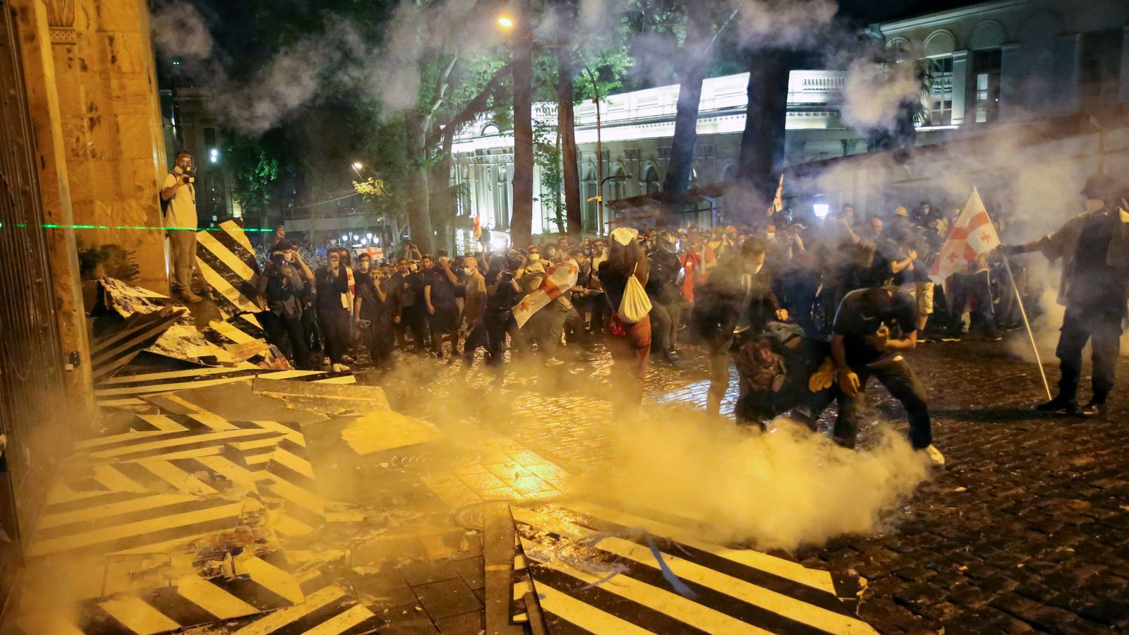 Police use tear gas against demonstrators during an opposition protest against "the Russian law" near the Parliament building in Tbilisi, Georgia, on Wednesday, May 1, 2024. Pic: AP