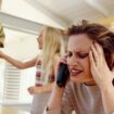 Stressed woman on telephone