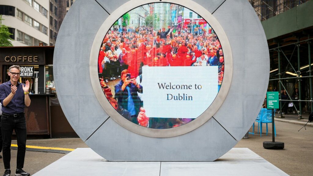 People in Dublin are seen during the reveal of The Portal,in New York City, U.S., May 8, 2024. Pic: Reuters