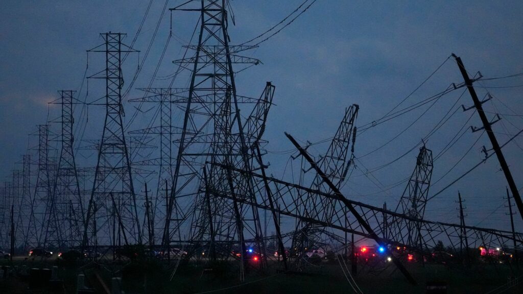 Transmission power lines down in Cypress, Texas. (Melissa Phillip/Houston Chronicle via AP)