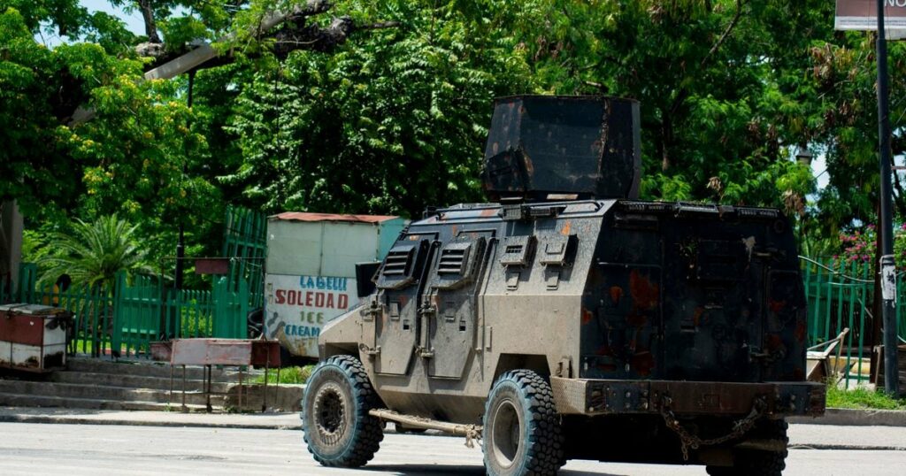 A police tank patrols the area where armed gangs have spread terror, in Port-au-Prince, Haiti, on May 24, 2024.