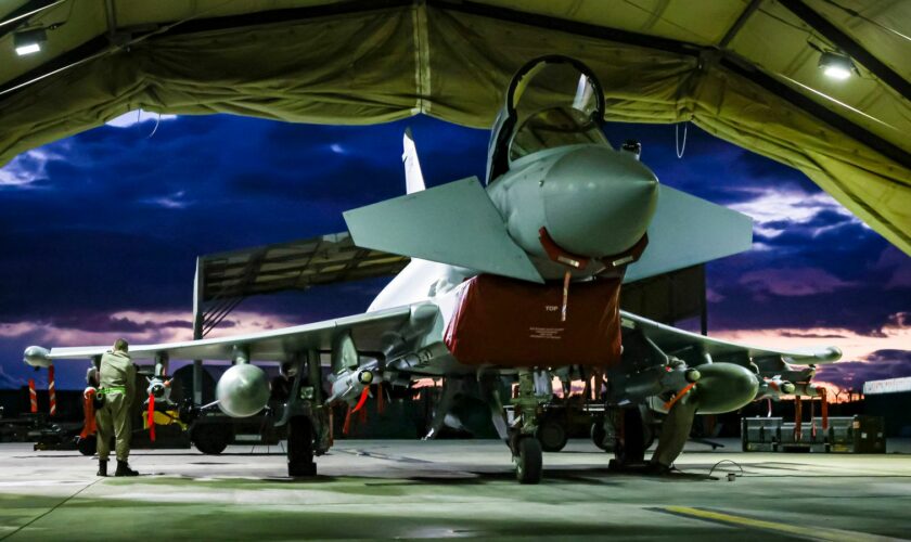 RAF Weapon Technicians prepare RAF Typhoon FRG4s aircraft to conduct further strikes against Houthi military targets in Yemen, from RAF Akrotiri, Cyprus, Saturday, Feb. 3, 2024. (AS1 Leah Jones/Ministry of Defence via AP)