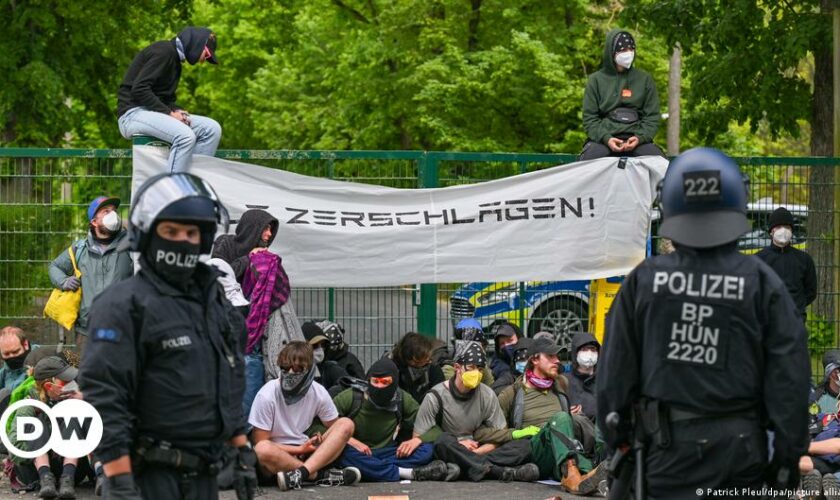 Banner put up by protesters against the Tesla Gigafactory in Grünheide reading