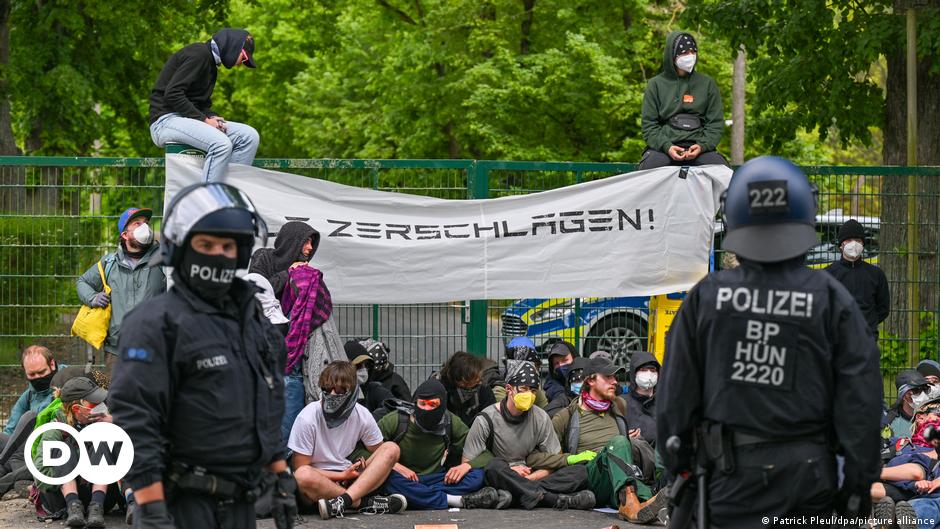 Banner put up by protesters against the Tesla Gigafactory in Grünheide reading