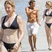 Ellie Goulding slips into a skimpy black bikini as she enjoys beach stroll with her surf instructor boyfriend Armando Perez in Costa Rica following marriage split