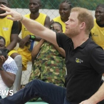 Prince Harry playing sit-down volleyball