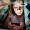 Smartphones and social media should be banned for under 16s, MPs warn