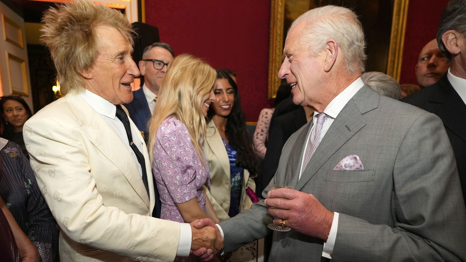 The King greeting Sir Rod Stewart. Pic: PA