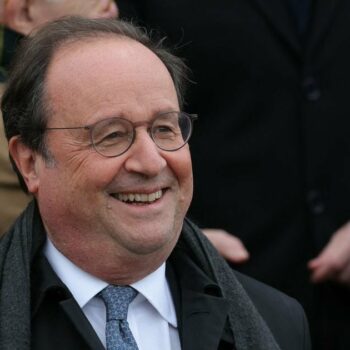 Former French President Francois Hollande poses for a group photograph on the front steps of the Assemblee Nationale parliament building in Paris ahead of a demonstration against anti-Semitism in Paris, on November 12, 2023. Tens of thousands are expected to march Sunday in Paris against anti-Semitism amid bickering by political parties over who should take part and a surge in anti-Semitic incidents across France. Tensions have been rising in the French capital, home to large Jewish and Muslim communities, in the wake of the October 7 attack by Palestinian militant group Hamas on Israel, followed by a month of Israeli bombardment of the Gaza Strip. France has recorded nearly 1250 anti-Semitic acts since the attack. National Assembly speaker Yael Braun-Pivet and Gerard Larcher, the Senate speaker, called on November 7 for a "general mobilisation" at the march against the upsurge in anti-Semitism. (Photo by Thomas SAMSON / POOL / AFP)