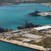 FILE PHOTO: Navy vessels are moored in port at the U.S. Naval Base Guam at Apra Harbor, Guam March 5, 2016.  Major Jeff Landis,USMC (Ret.)/Naval Base Guam/Handout/File Photo via REUTERS. ATTENTION EDITORS - THIS IMAGE WAS PROVIDED BY A THIRD PARTY - RTS1AYM8