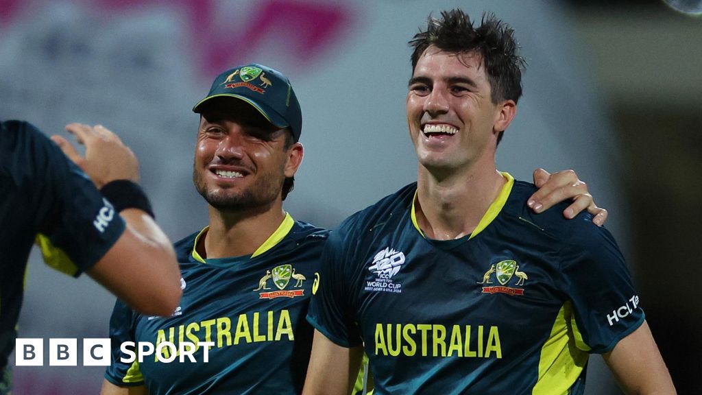 Australia's Pat Cummins and Marcus Stoinis celebrate a wicket against Bangladesh at 2024 T20 World Cup