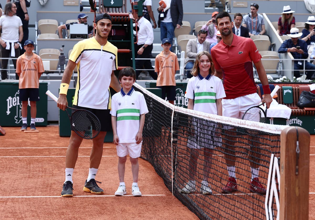 French Open LIVE: Novak Djokovic battles injury and trails Francisco Cerundolo - latest score