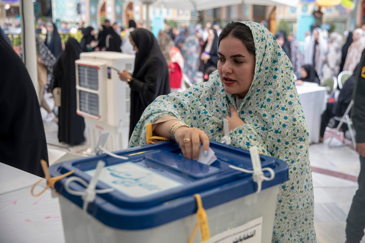 Iran election goes to a runoff between a reformist and conservative