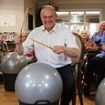 It's Ed Ravey! Lib Dem leader takes to the drums to belt out We Will Rock You in latest bizarre election photo-op