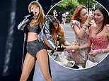 Taylor and Travis get carried away in London! Taylor Swift's American Football star fella Travis Kelce takes to the stage with her for the first time at Wembley - picking her up and fanning her during performance that thrills the crowd