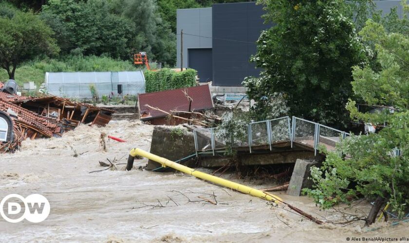 Flood water causing a river in Emilia-Romagna to burst its banks