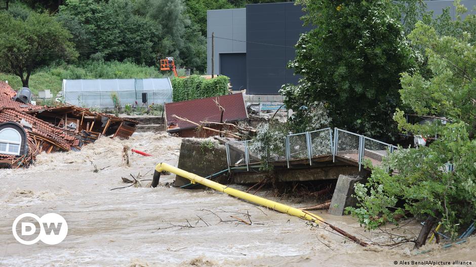 Flood water causing a river in Emilia-Romagna to burst its banks