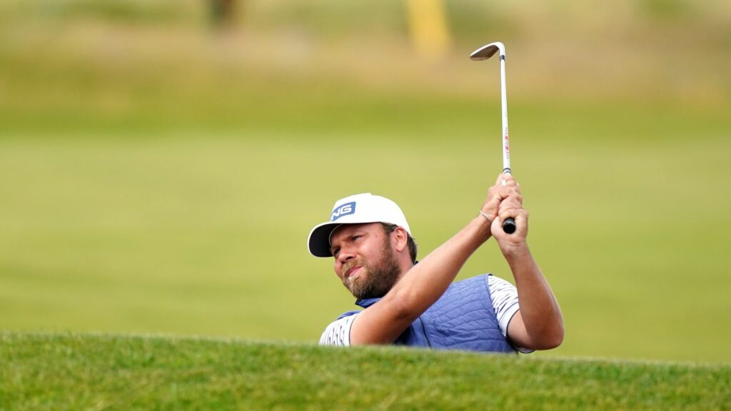 Dan Brown competes at The Open. Pic: PA