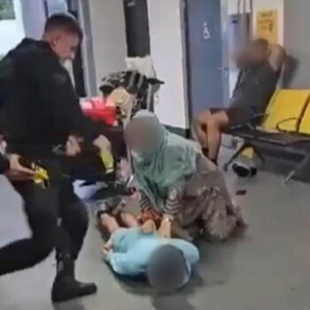 Still of GMP police arrest in Terminal 2 Manchester Airport
