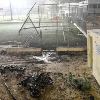 The scene after rockets hit a football pitch. Pic: Reuters