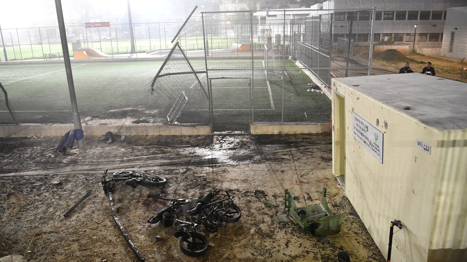 The scene after rockets hit a football pitch. Pic: Reuters