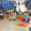 Just Stop Oil activists block departure gates at Gatwick airport