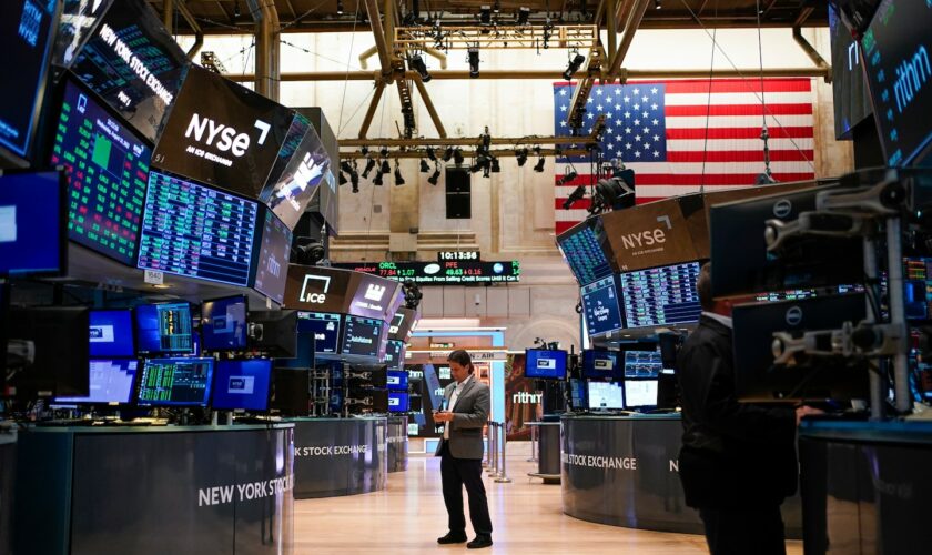 Dow soars more than 700 points to close at another record high