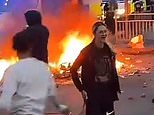 Evil on our streets: Brazen thugs torch a double-decker, overturn police cars and pelt officers with rocks - let's hope these yobs have been arrested! If not, can you help identify them?
