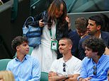 Excuse me! Emma Raducanu's mum squeezes past Romeo Beckham to watch her daughter take first set at Wimbledon