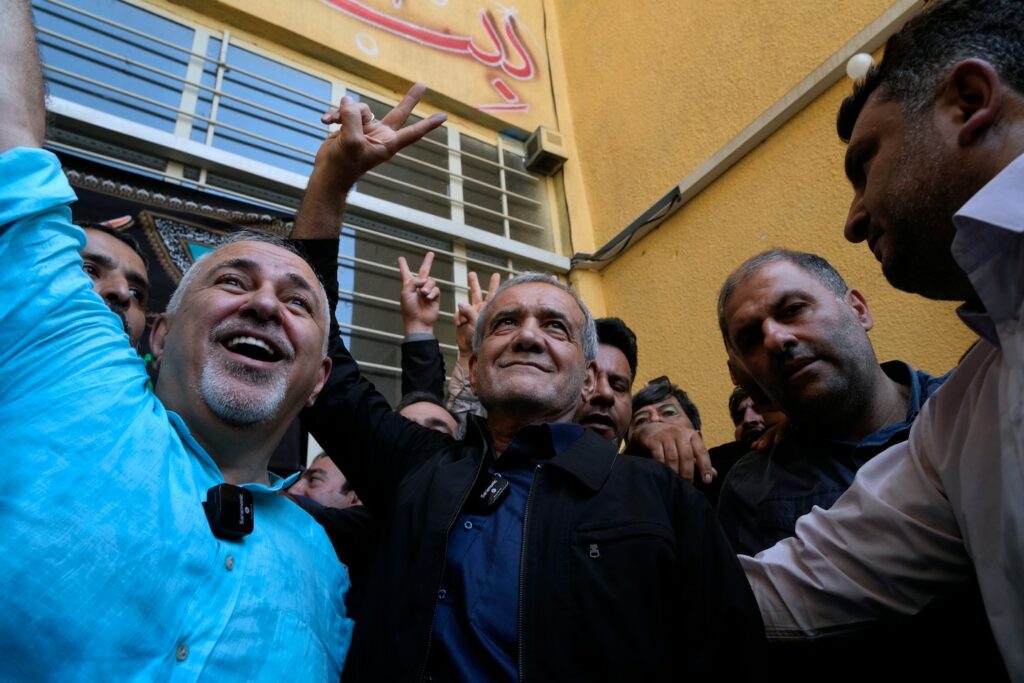 Iranian reformist wins presidency, beating a prominent hard-liner