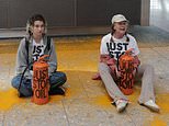 Just why bother? JSO eco-clowns strike Heathrow Airport as part of 'summer chaos crusade'... but the two lone protestors with some cans of orange paint don't get much further than departures