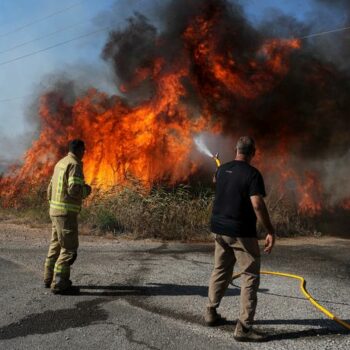 Middle East updates: Hezbollah fires '200 rockets' at Israel