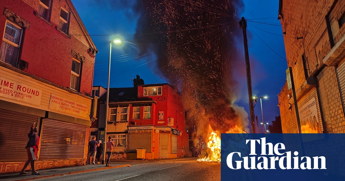 Police car turned over and vehicles set alight in disorder in Leeds