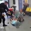 Police officer suspended after airport kicking video